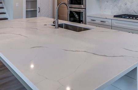 White kitchen island countertop with subtle gray veining